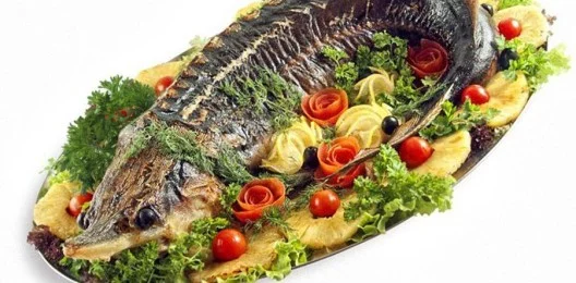 Осетр фаршированный семгой и белыми грибами