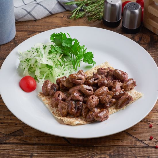 Куриные сердечки с чесночным соусом