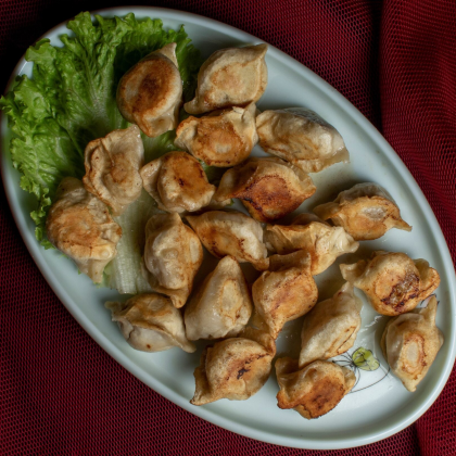 115.Пельмени жареные 猪肉煎饺