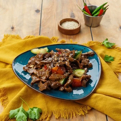 Куриные желудки с огурцом