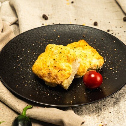 Филе минтая под сырной шапкой