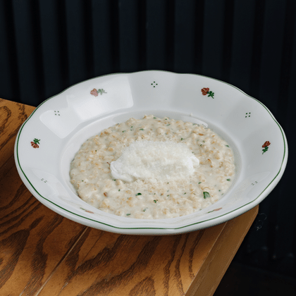 Каша 5 злаков с пармезаном и яйцом пашот